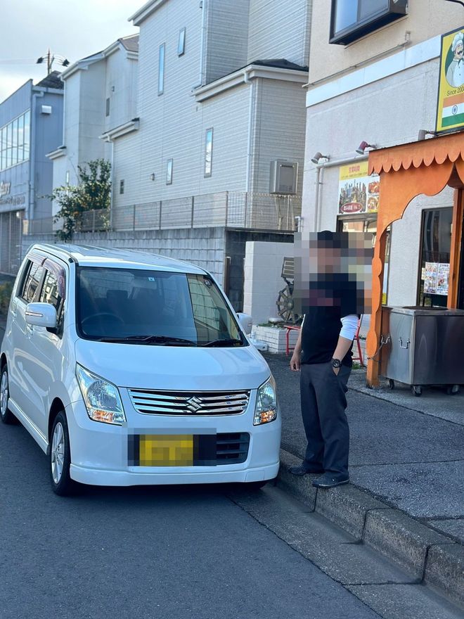 Delivered Suzuki Wagon R — face and plate blurred for privacy