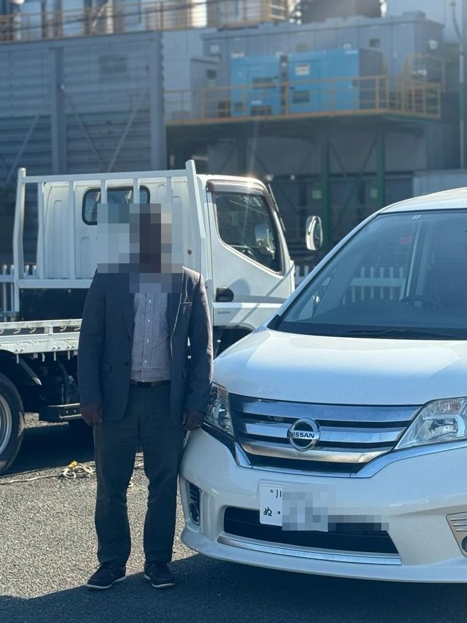 Delivered Nissan Serena — face and plate blurred for privacy